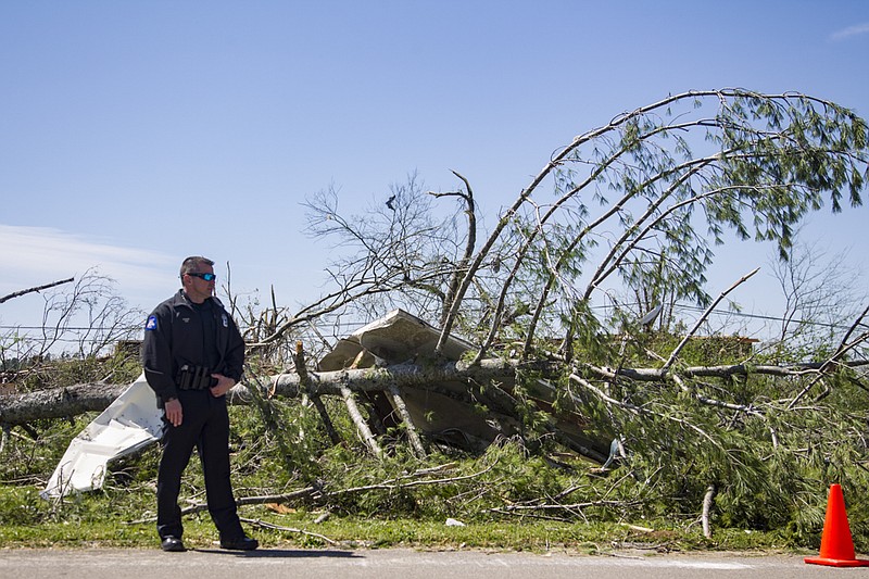 Staff photo by Troy Stolt / Chattanooga Police Chief David Roddy stands on the road in Holly Hills during a media tour to show members of the media damage caused by Sunday's tornado on Wednesday, April 15, 2020 in East Brainerd, Tenn.