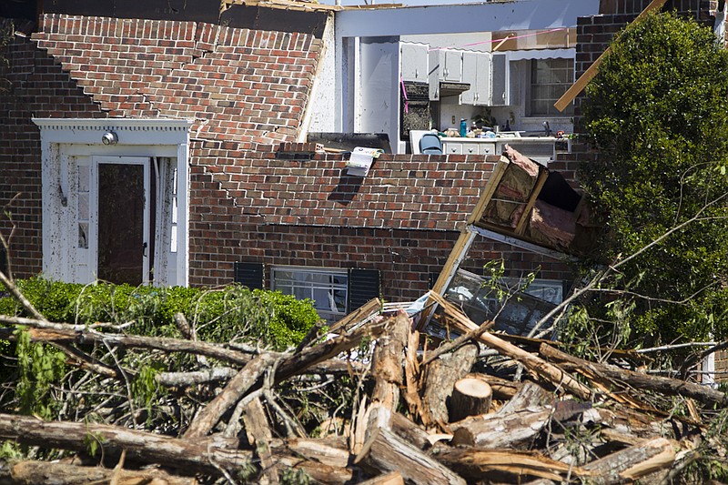 Staff photo by Troy Stolt / Lisa Cowan's home in Holly Hills neighborhood is seen damaged by Sunday's tornado on Wednesday, April 15, 2020 in East Brainerd, Tenn.