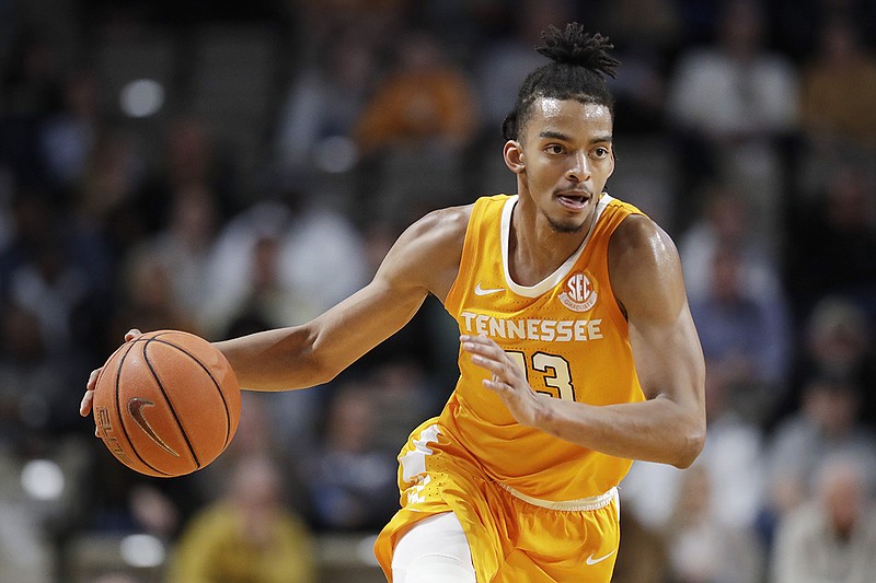 AP photo by Mark Humphrey / Redshirt junior guard Jalen Johnson brings the ball up the court for Tennessee during the Vols' 66-45 win at Vanderbilt on Jan. 18. Johnson has transferred to East Tennessee State for his final college season in 2020-21.