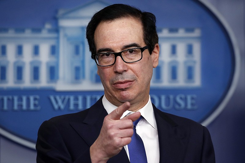 Treasury Secretary Steven Mnuchin speaks about the coronavirus in the James Brady Press Briefing Room at the White House, Monday, April 13, 2020, in Washington. (AP Photo/Alex Brandon)