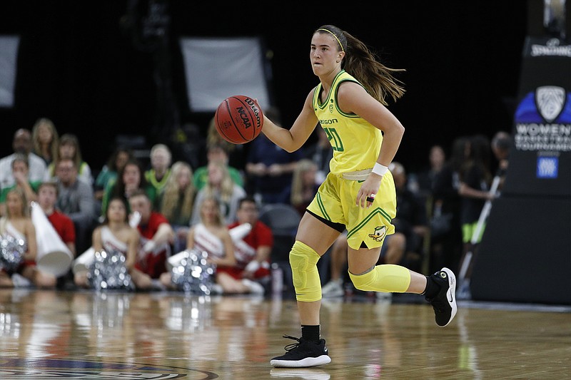 AP file photo by John Locher / Oregon's Sabrina Ionescu, pictured, was taken No. 1 overall by the New York Liberty in the WNBA draft Friday night. Two of her former Ducks teammates joined her as first-round selections, with Satou Sabally going second to the Dallas Wings and Ruthy Hebard going eighth to the Chicago Sky.