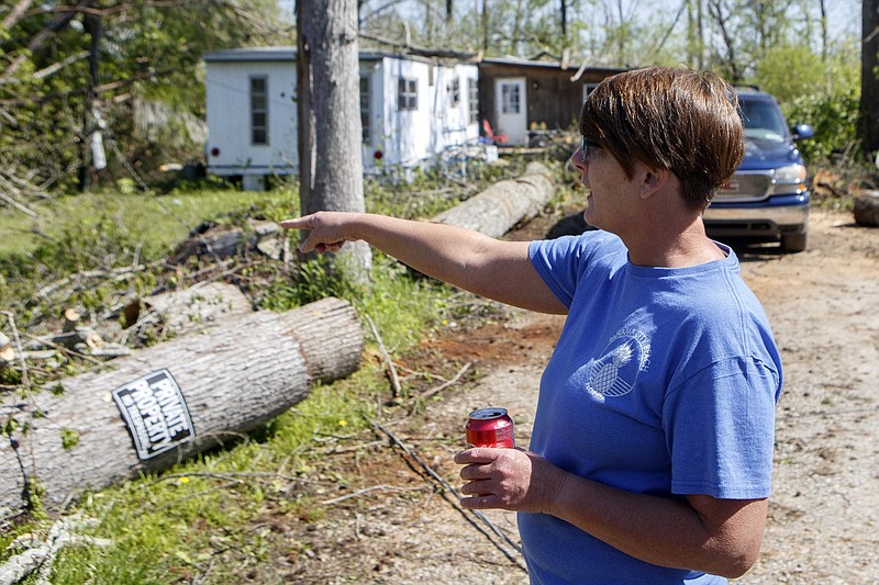 Staff photo by C.B. Schmelter / Brooke Bridges talks about her experience with the storm at her home off of Bill Reed Road on Thursday, April 16, 2020 in Ooltewah, Tenn. Bridges' home is near the Auburn Hills Mobile Home Park, which was one of the hardest hit areas as an Easter tornado tore through the region late Sunday night and early Monday morning.