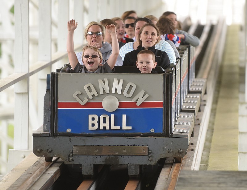 Staff file photo / Rides on the Cannon Ball roller coaster will be delayed until the Georgia governor's office gives the green light for amusement parks to reopen during the coronavirus pandemic.