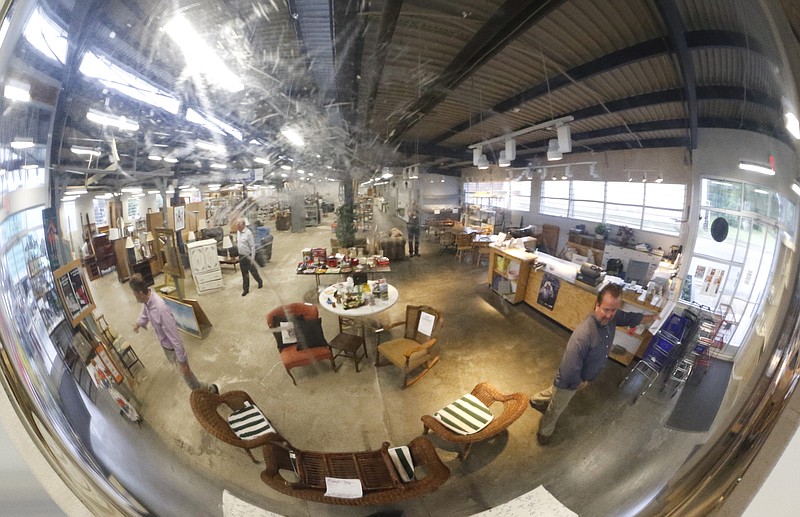 Staff File Photo / A mirrored view of some of the inventory at the Habitat for Humanity ReStore off East Main Street in Chattanooga.