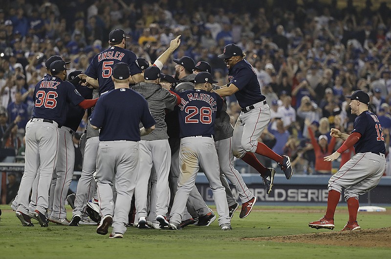 AP photo by David J. Phillip / The Boston Red Sox celebrate their World Series title after beating the Los Angeles Dodgers in Game 5 of the best-of-seven set on Oct. 28, 2018, in Los Angeles.