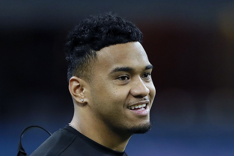 AP file photo by Charlie Neibergall / Former Alabama quarterback Tua Tagovailoa was taken No. 5 overall in the NFL draft Thursday night by the Miami Dolphins.