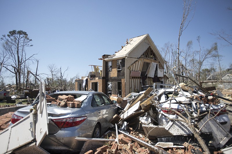 Staff photo by Troy Stolt / The home of Brad Jones is seen on Tuesday, April 14, 2020 in East Brainerd, Tenn. Late Sunday, an EF-3 tornado ripped through the Hickory Valley neighborhood in East Brainerd, lifting Jones' house off of its foundation, it landed several feet behind.