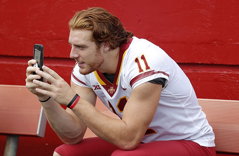 AP photo by Charlie Neibergall / Iowa State tight end Chase Allen takes a photo with his cellphone during the Cyclones' annual football media day in August 2018 in Ames, Iowa.