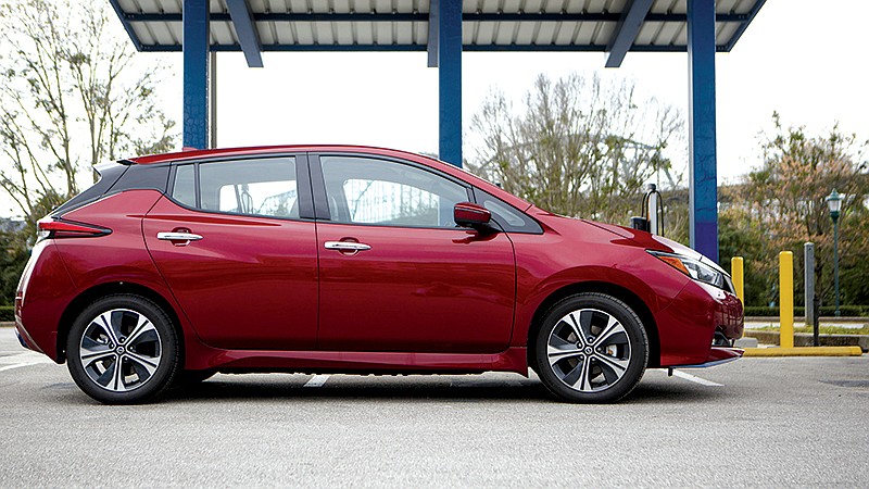 The Nissan Leaf is seen at a charging station at Coolidge Park. / Staff photo by C.B. Schmelter