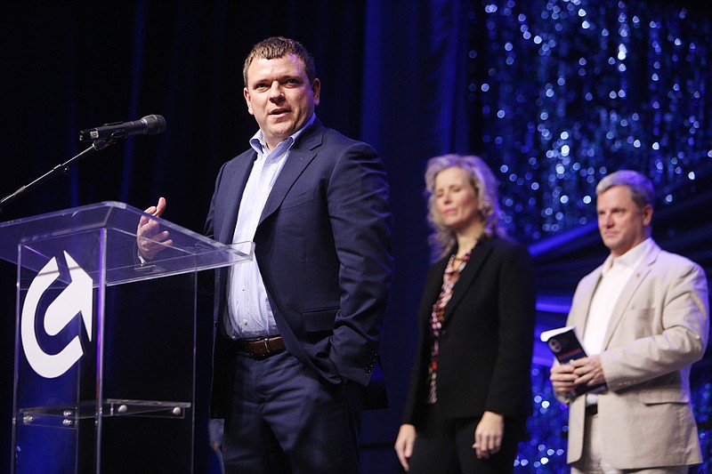 Staff file photo / Chad Eichelberger, president of Reliance Partners, talks at a Chattanooga Area Chamber of Commerce luncheon.