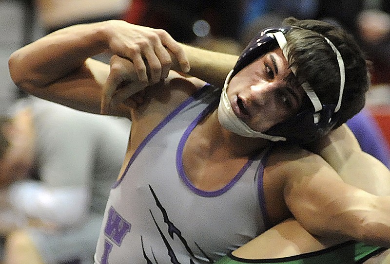 Keystone High School Logan Stiner during a wrestling match in Sheffield Village, Ohio. The coroner said Stiner, who died May 27, 2014, had more than 70 micrograms of caffeine per milliliter of blood in his system.