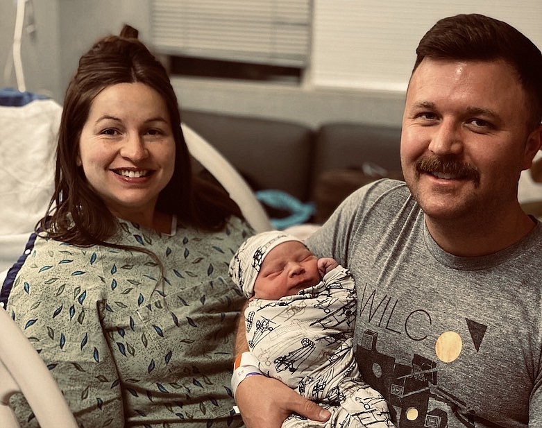 Hilary Robinson and Tyson Robinson pose for a picture with their newborn son, Memphis, at Erlanger East Hospital on April 19, 2020. / Contributed photo by Hilary Robinson
