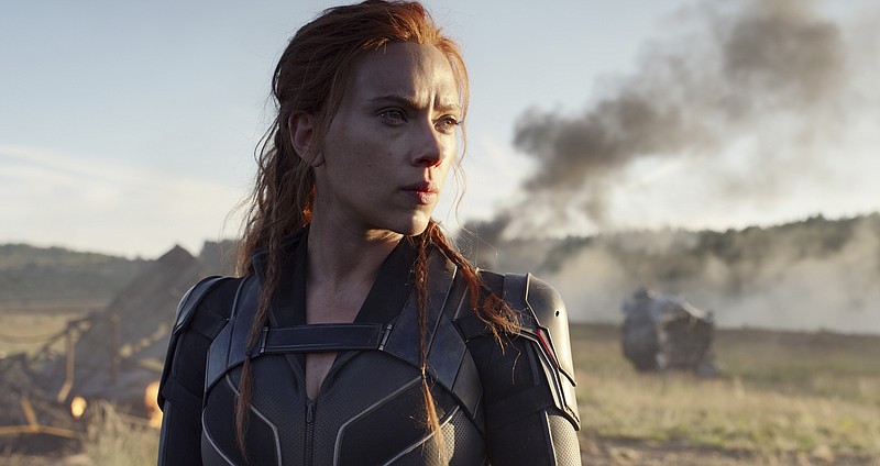 This image released by Disney/Marvel Studios' shows Scarlett Johansson in a scene from "Black Widow." The film was to kick off what promised to be a typically lucrative summer moviegoing season, which runs Memorial Day through Labor Day and generally accounts for nearly 40% of the yearly North American box office. The Walt Disney Co. overhauled its release schedule, moving the dates of half a dozen Marvel movies, including "Black Widow," which will now open Nov. 6. (Marvel Studios/Disney via AP)