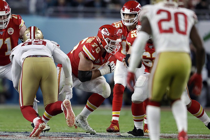 AP photo by John Bazemore / Kansas City Chiefs offensive guard Laurent Duvernay-Tardif, center, blocks against the San Francisco 49ers during the first half of Super Bowl LIV on Feb. 2 in Miami Gardens, Fla.