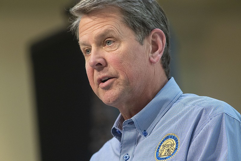 Georgia Gov. Brian Kemp speaks during a news conference at the Capitol building in Atlanta on Monday, April 27, 2020, during the coronavirus outbreak. (Alyssa Pointer/Atlanta Journal-Constitution via AP)