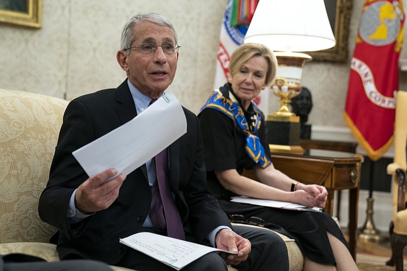 White House coronavirus response coordinator Dr. Deborah Birx listens as director of the National Institute of Allergy and Infectious Diseases Dr. Anthony Fauci speaks during a meeting between President Donald Trump and Gov. John Bel Edwards, D-La., about the coronavirus response, in the Oval Office of the White House, Wednesday, April 29, 2020, in Washington. (AP Photo/Evan Vucci)


