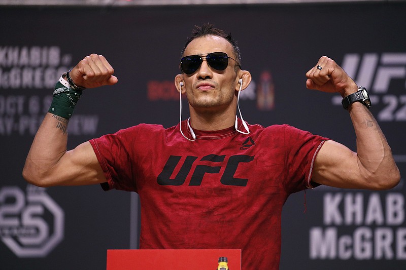 AP photo by John Locher / Tony Ferguson poses on Oct. 5, 2018, in Las Vegas during a ceremonial weigh-in for UFC 229. The Ultimate Fighting Championship is scheduled to return North American sports to competition with Saturday's UFC 249 event at Jacksonville (Florida) Arena, which will be headlined by lightweight title contenders Ferguson and Justin Gaethje.