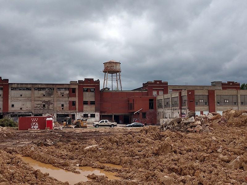 Staff photo by Mike Pare / Demolition work already has begun around the former Standard-Coosa-Thatcher textile plant off East Main Street, which is slated to hold new housing and commercial space.