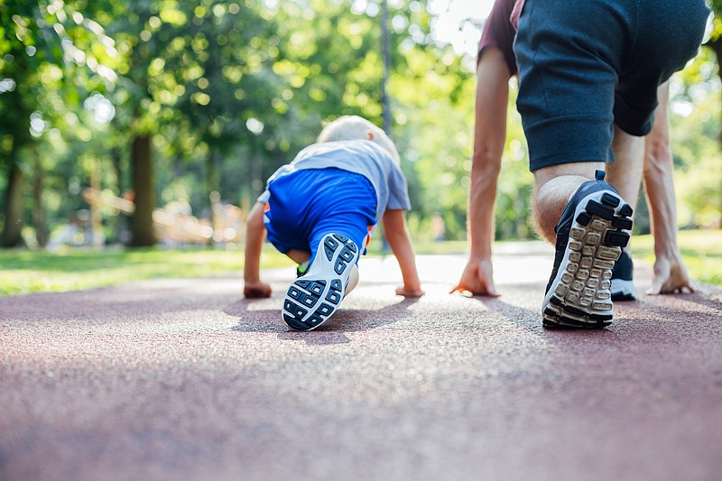 Family running / Getty Images