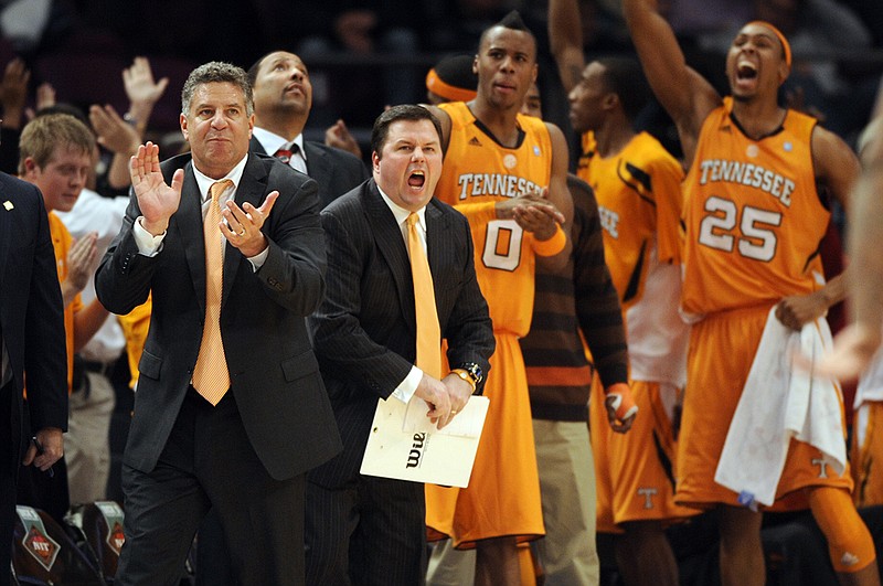 AP photo by Henny Ray Abrams / Tennessee men's basketball coach Bruce Pearl, left, assistant coach Jason Shay and their players celebrate during an NIT Season Tip-Off tournament game against Villanova on Nov. 26, 2010, in New York. Shay, an assistant at East Tennessee State the past five seasons, has been promoted to head coach to fill the vacancy created when Steve Forbes left for Wake Forest.