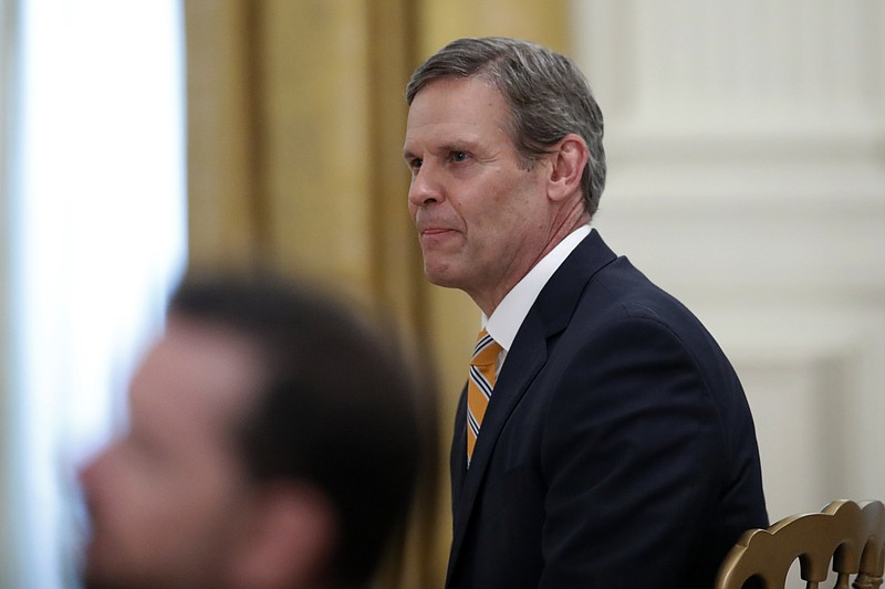Tennessee Gov. Bill Lee listens as President Donald Trump speaks about protecting seniors, in the East Room of the White House, Thursday, April 30, 2020, in Washington. (AP Photo/Alex Brandon)
