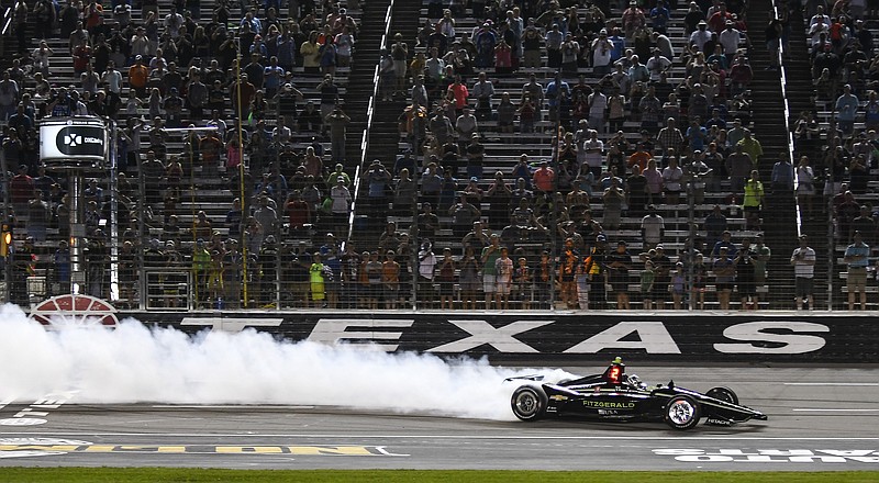 AP photo by Randy Holt / IndyCar driver Josef Newgarden celebrates a victory on June 8, 2019, at Texas Motor Speedway in Fort Worth. The same track will host what the rescheduled opener for the 2020 season on June 6.