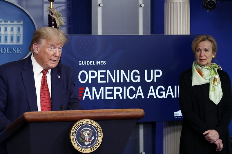 FILE - In this April 16, 2020, file photo, President Donald Trump speaks about the coronavirus in the James Brady Press Briefing Room of the White House in Washington, as Dr. Deborah Birx, White House coronavirus response coordinator, listens. The Trump administration has shelved a set of detailed documents created by the nation's top disease investigators meant to give step-by-step advice to local leaders deciding when and how to reopen mass transit, day care centers, restaurants, bars and other public places during the still-raging pandemic. (AP Photo/Alex Brandon, File)


