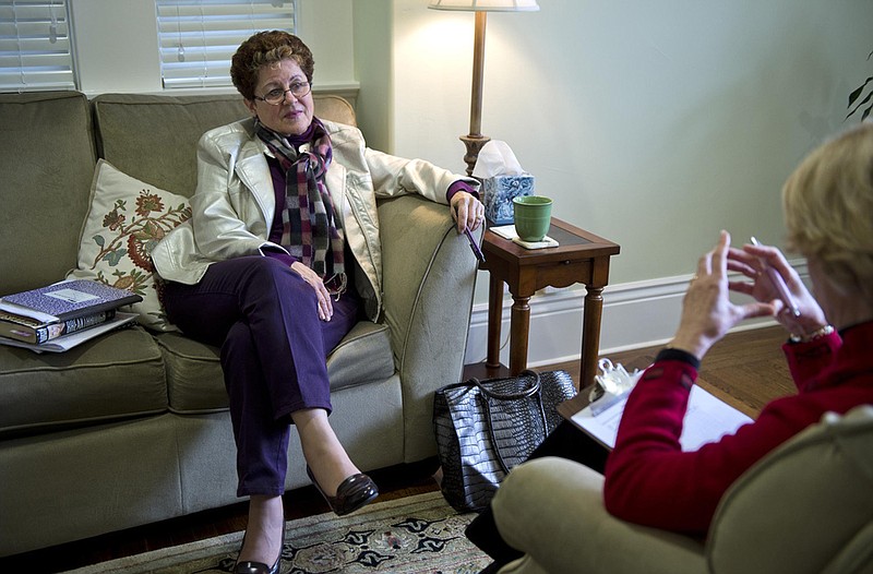 MCT File Photo / A patient listens to a therapist during a session several years ago in Sacramento, California. The COVID-19 virus, and its associated stresses, have compounded the need for people to talk to someone about their problems.