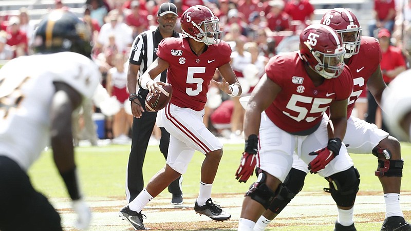 Tua gets help from younger brother Taulia at Alabama