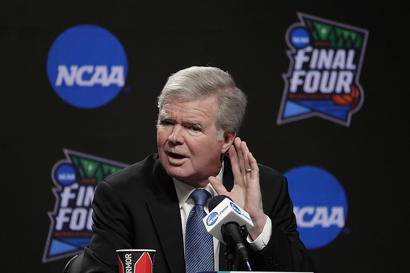 AP file photo by Matt York / NCAA president Mark Emmert said "we should assume" that major college football teams will start their 2020 schedules at different times and have an uneven number of games due to the coronavirus pandemic's effect on preseason preparation.