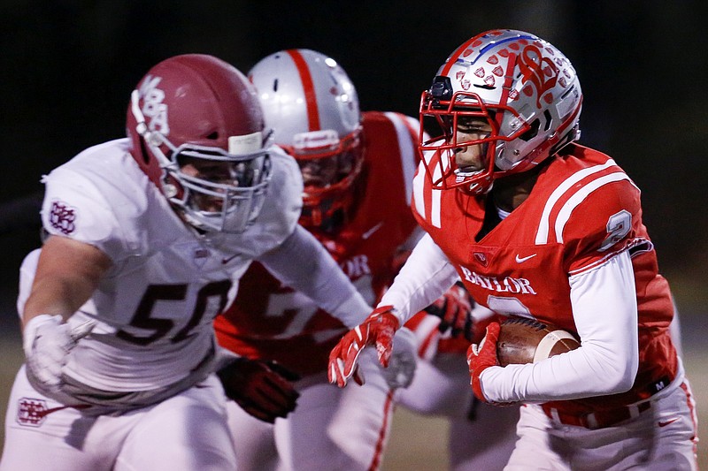 Staff photo by C.B. Schmelter / Baylor's Elijah Howard carries the ball during a TSSAA Division II-AA quarterfinal against visiting Montgomery Bell Academy on Nov. 15, 2019.