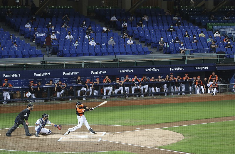 AP photo by Chiang Ying-ying / Fans are scattered through Xinzhuang Baseball Stadium to watch a professional game between the Uni-President Lions and the Fubon Guardians on Friday in New Taipei City, Taiwan.