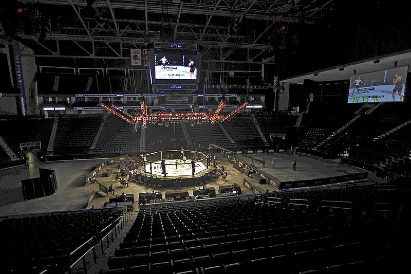 AP photo / Fighters compete without spectators at UFC 249 on Saturday in Jacksonville, Fla.