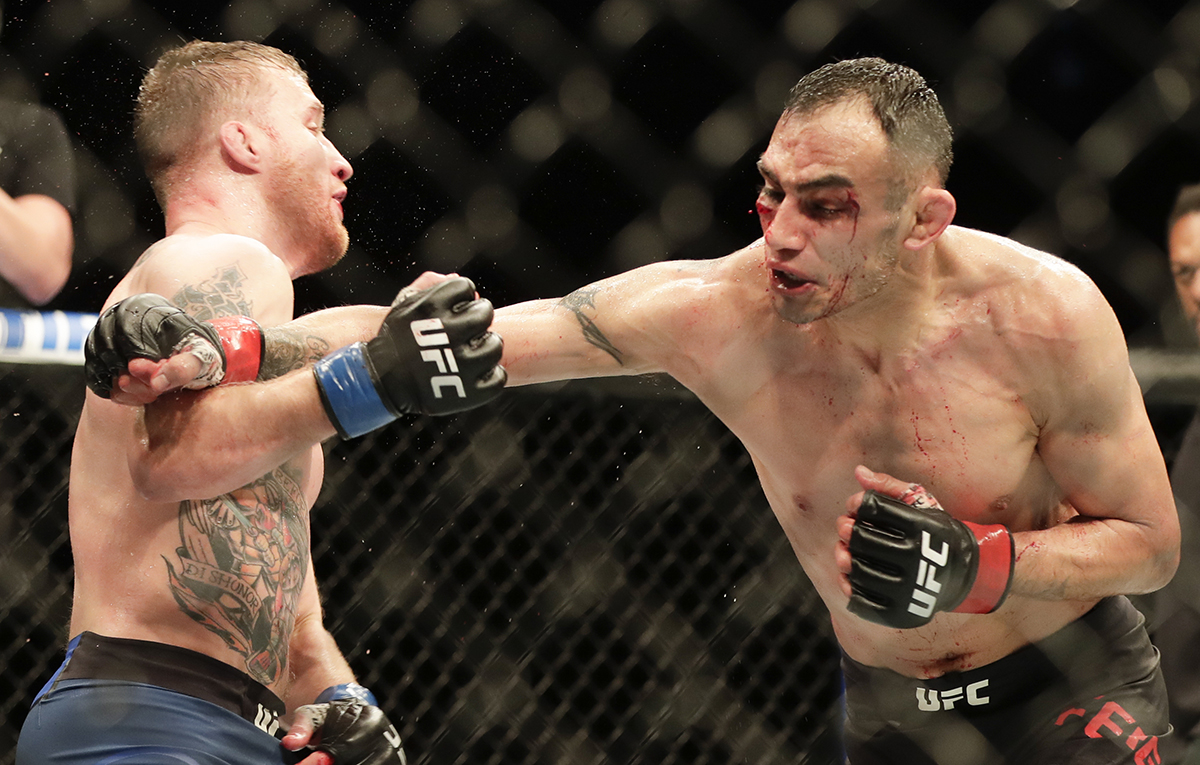 AP photo by John Raoux / Justin Gaethje, left, dodges a punch from Tony Ferguson during a UFC 249 on Saturday night in Jacksonville, Fla.