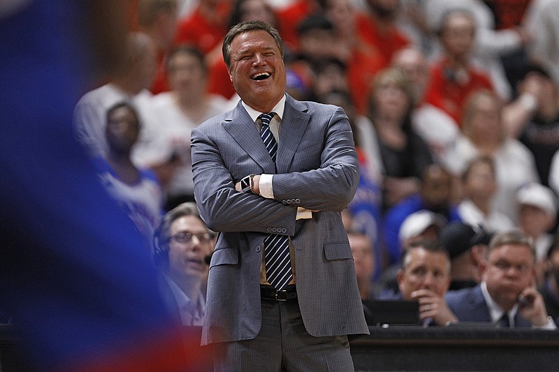 AP photo by Brad Tollefson / Kansas men's basketball coach Bill Self laughs during a road game against Texas Tech on March 7.