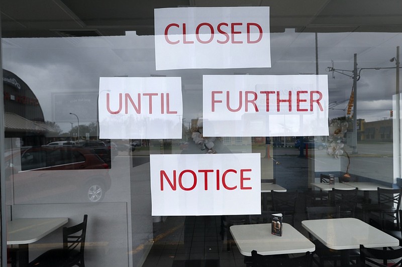 Vasi's Cafe is shown closed in St. Clair Shores, Mich., Friday, May 8, 2020. Many restaurants have closed due to the coronavirus pandemic. (AP Photo/Paul Sancya)


