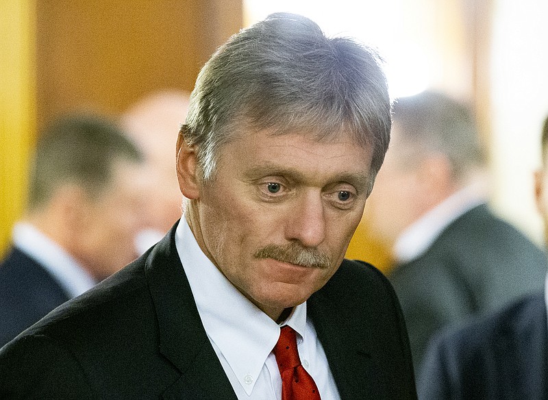 FILE - In this Friday, Feb. 7, 2020 file photo Kremlin spokesman Dmitry Peskov arrives to attend the talks between Russian President Vladimir Putin and Belarusian President Alexander Lukashenko in Rosa Khutor, in the Black Sea resort of Sochi, Russia. Russian President Vladimir Putin's spokesman Peskov said Tuesday May 12, 2020, that he is hospitalized with the coronavirus. The announcement comes just a day after Putin said Russia was successful in slowing down infections and announced easing some of the nationwide lockdown restrictions. (AP Photo/Alexander Zemlianichenko, Pool, File)


