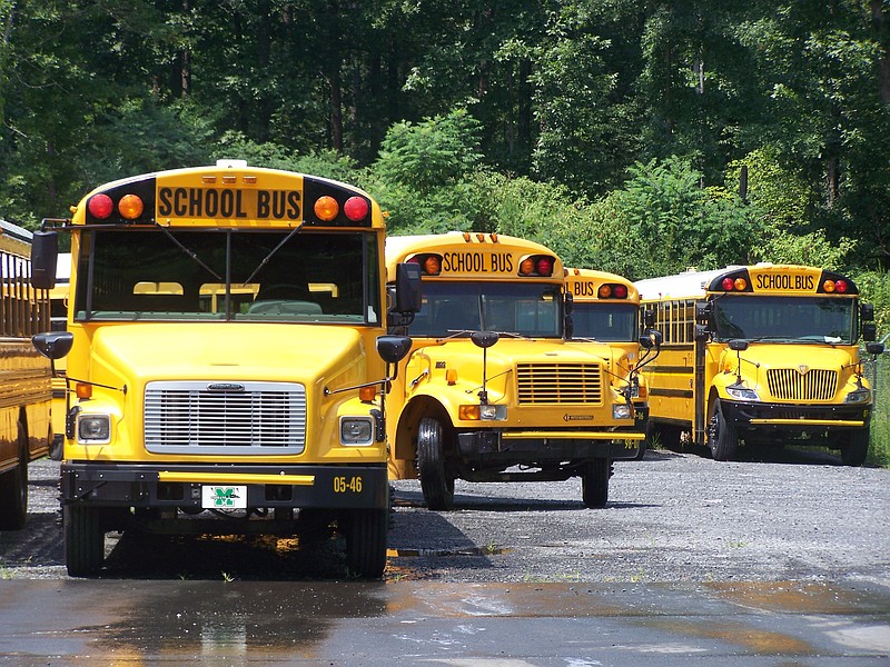 Staff Photo by Kelly Jackson / One plan for Murray County schools would call for district buses (shown here in a file photo) to drive around with mobile hotspots, allowing students to download assignments.