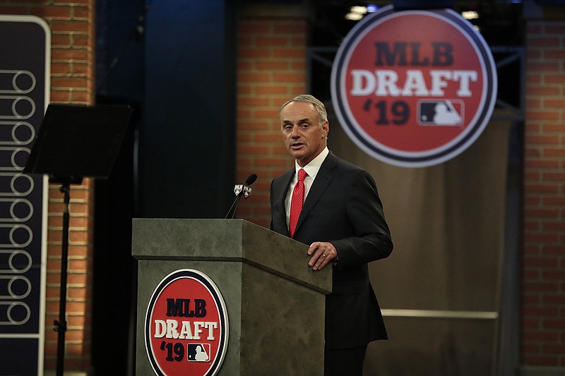 AP photo by Julio Cortez / MLB commissioner Rob Manfred speaks during the first round of baseball's 2019 amateur draft last June 3 in Secaucus, N.J.