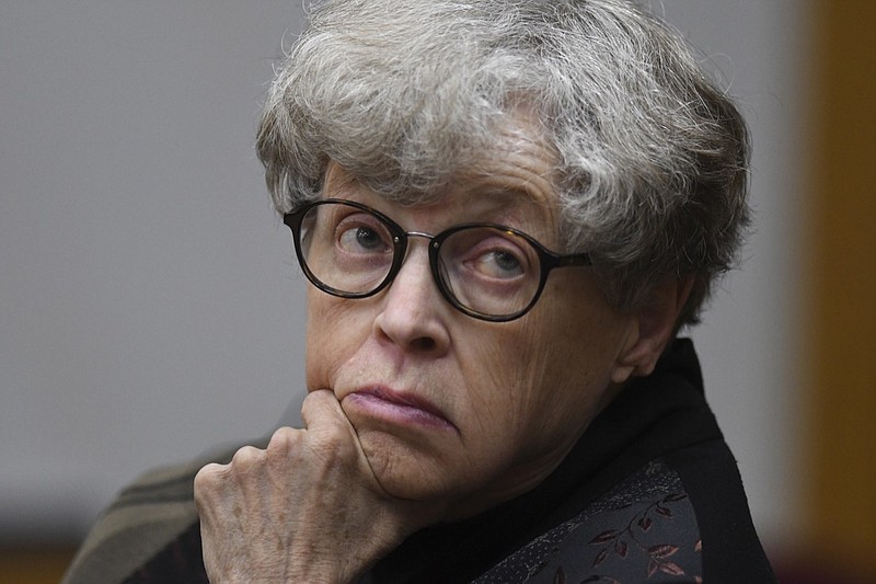 FILE - In this April 9, 2019 file photo, former Michigan State University president Lou Anna Simon appears in court in Charlotte, Mich. A judge has dismissed criminal charges Wednesday, May 13, 2020 against Simon arising from the Larry Nassar sexual assault scandal. Simon was ordered to trial last year on charges that she lied to police about her knowledge of a sexual misconduct complaint against Nassar. Nassar was a campus doctor and now is serving decades in prison.(Matthew Dae Smith/Lansing State Journal via AP, File)