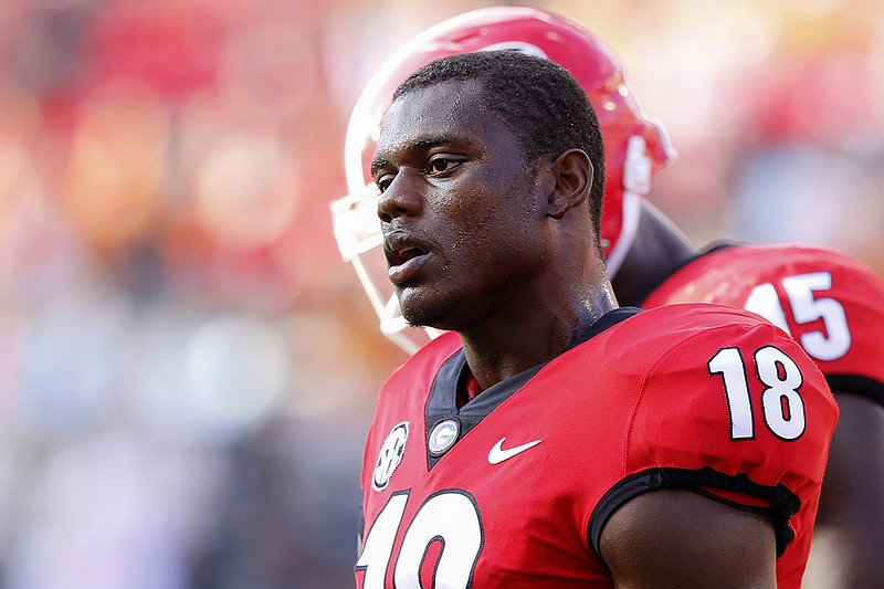 Staff photo by C.B. Schmelter / Georgia defensive back Deandre Baker looks toward the sideline during a matchup with SEC East rival Tennessee on Sept. 29, 2018, at Sanford Stadium in Athens, Ga. Baker was a first-round pick for the New York Giants in the 2019 NFL draft.