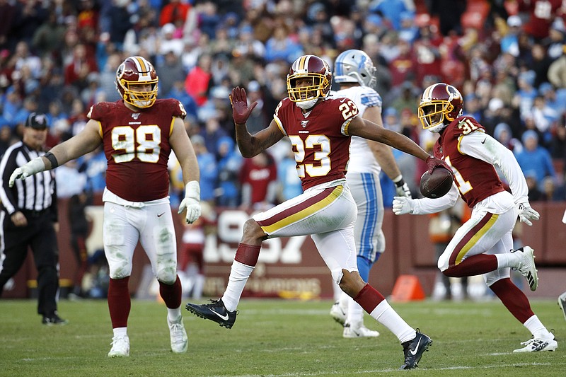 AP photo by Patrick Semansky / Washington Redskins cornerback Quinton Dunbar, center, celebrates after intercepting a pass thrown by Detroit Lions quarterback Jeff Driskel during the second half on Nov. 24, 2019, in Landover, Md. Dunbar was traded to the Seattle Seahawks in the offseason.