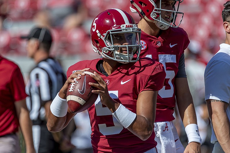 AP photo by Vasha Hunt / Alabama freshman quarterback Taulia Tagovailoa warms up for a home game against Southern Mis on Sept. 21, 2019.