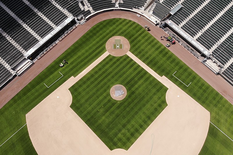 AP file photo by Elaine Thompson /  T-Mobile Park is the home of Major League Baseball's Seattle Mariners.