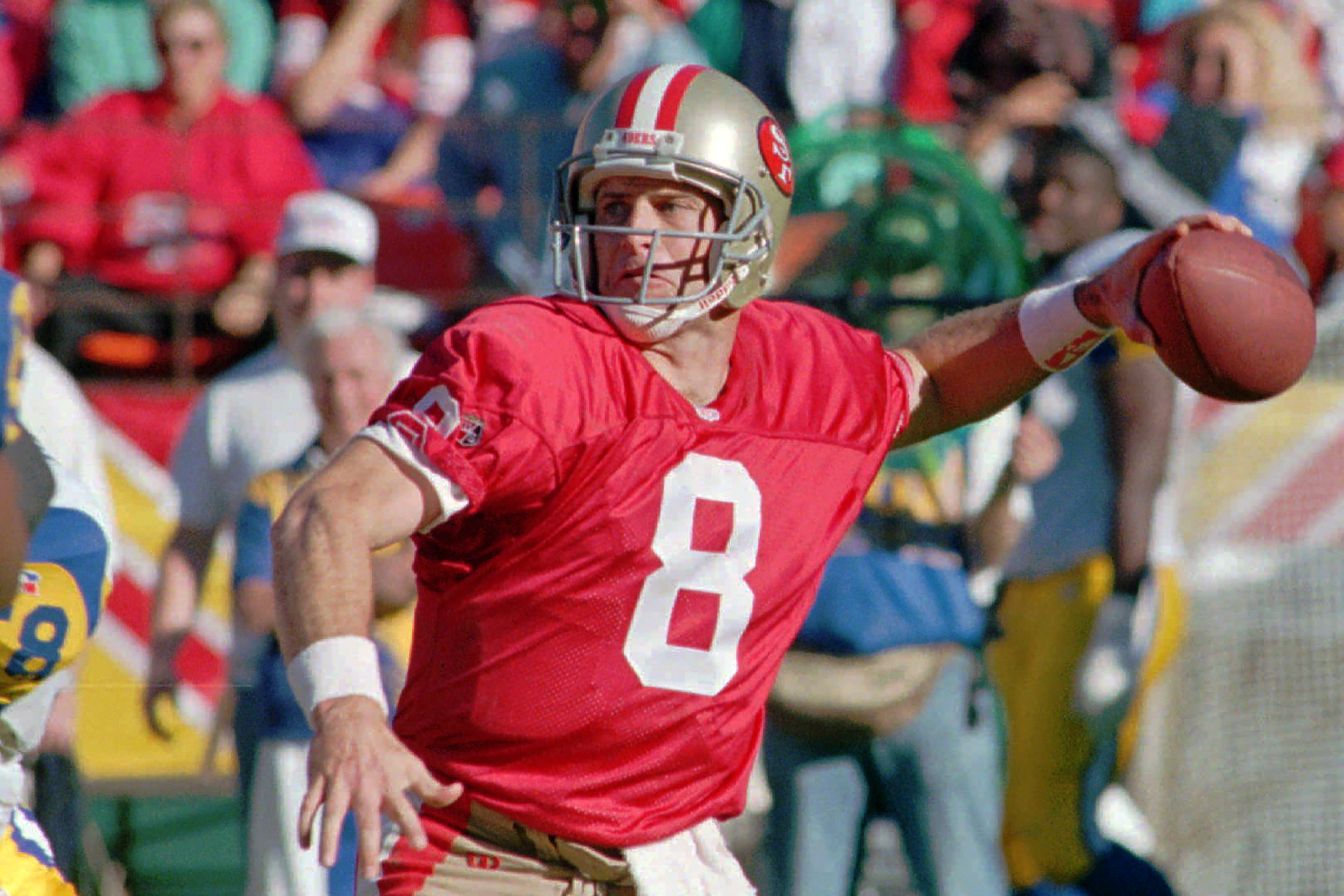 Quarterback Steve Young of the San Francisco 49ers throws a pass