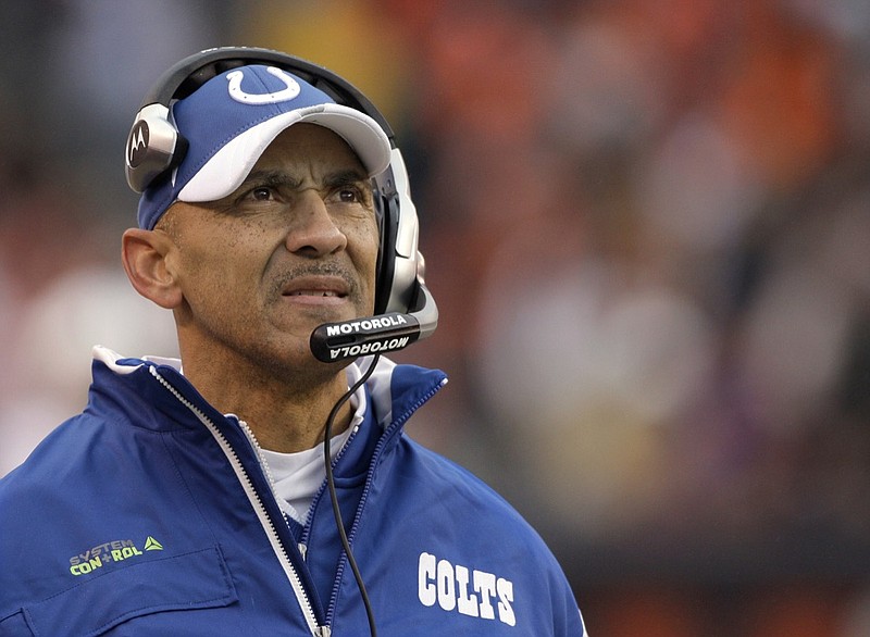 FILE - In this Nov. 30, 2008, file photo, Indianapolis Colts coach Tony Dungy watches from the sideline as his team plays the Cleveland Browns during the third quarter of an NFL football game in Cleveland. Dungy is the first African-American head coach to win a Super Bowl and has been a strong advocate of more diversity in coaching hires. (AP Photo/Amy Sancetta, File)