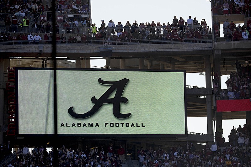 AP photo by Andrew Harnik / Fans stand before the start of an SEC football matchup between LSU and host Alabama at Bryant-Denny Stadium in Tuscaloosa on Nov. 9, 2019.