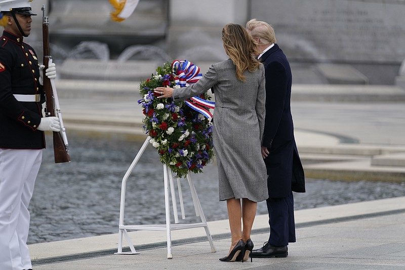 The Associated Press / President Donald Trump and first lady Melania Trump participate in a wreath-laying ceremony at the World War II Memorial to commemorate the 75th anniversary of Victory in Europe Day on May 8, 2020, in Washington, D.C.