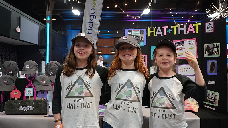 Students smile for a picture in front of their project at Bridge Innovate's 2019 Bright Spark's Summer Invention Challenge. Photo contributed by Bridge Innovate.