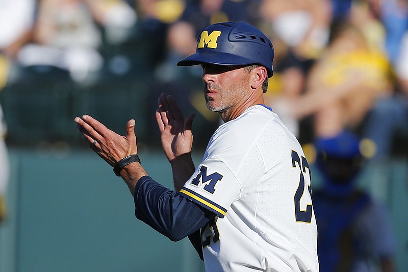 AP photo by Ringo H.W. Chiu / Michigan baseball coach Erik Bakich watches as the Wolverines take on host UCLA in an NCAA super regional on June 8, 2019. Michigan won that series to advance to the College World Series and reached the championship matchup in Omaha, Neb., losing to Vanderbilt.